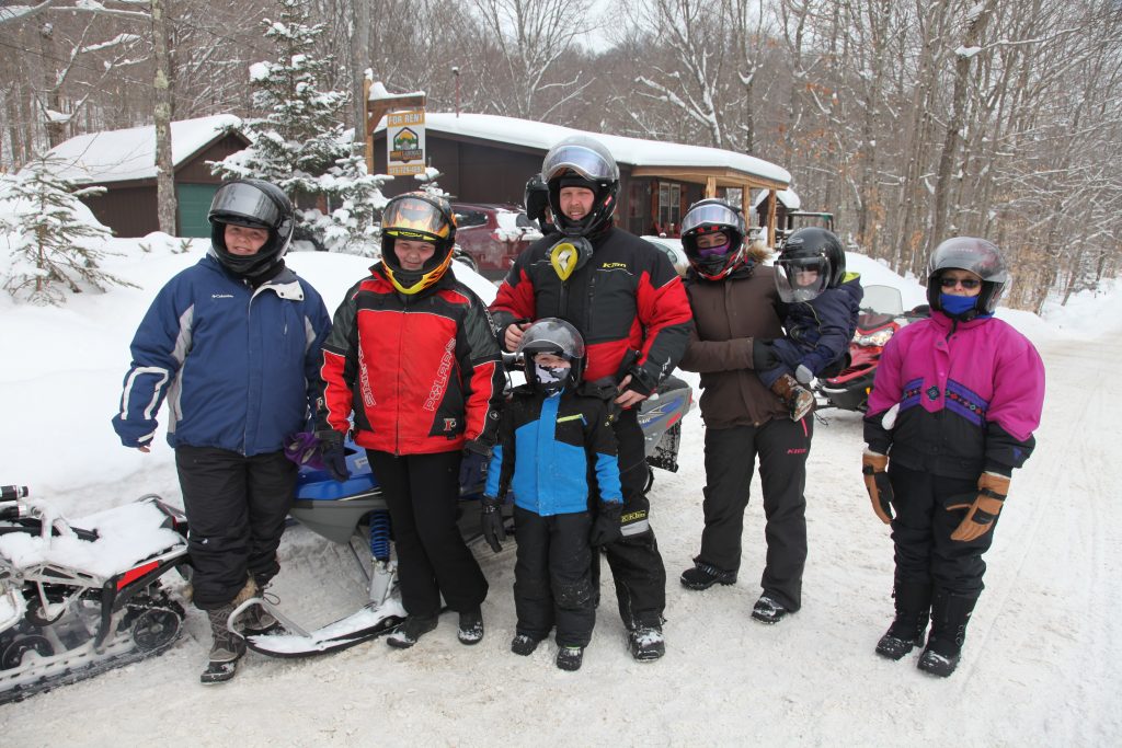 8 people before getting on snowmobiles